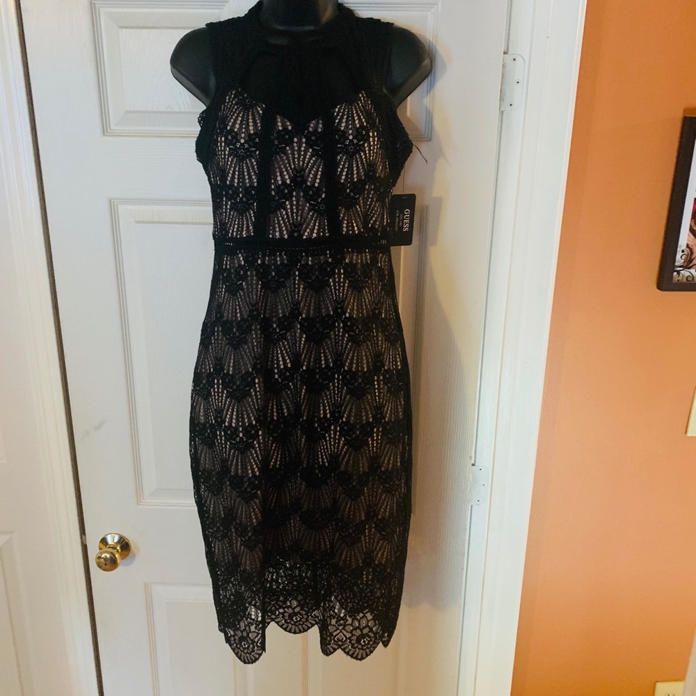Guess black with nude underlay cocktail dress.